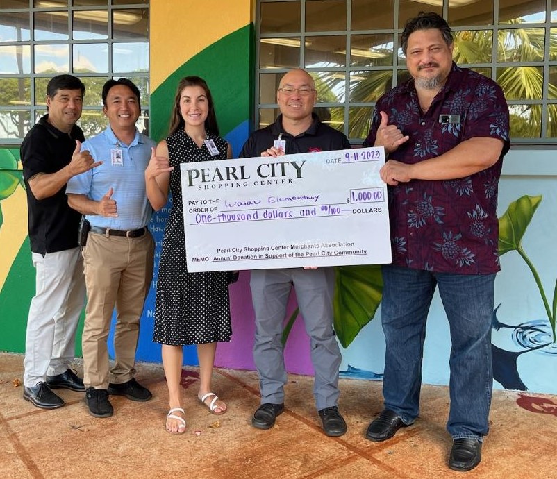 Pearl City Highlands Elementary and Waiau Elementary receive $1000.00 check donations from the Pearl City Shopping Center Merchants Association