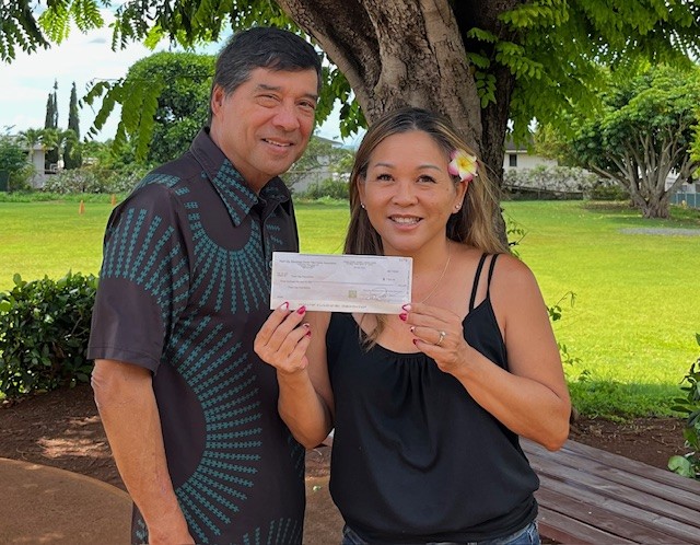 Pearl City Shopping Center Merchants Association supports Momilani Community Center’s Halloween Bash with $350.00 check donation