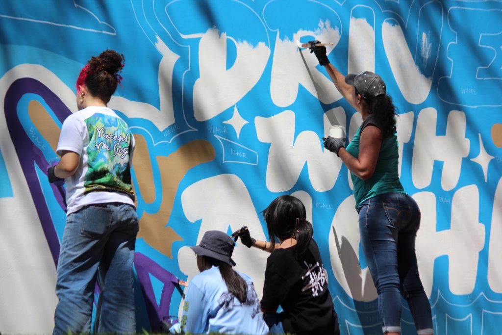 Pearl City High School’s DRIVE WITH ALOHA mural painting project got underway on the school campus Saturday morning