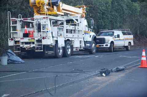 Downed power pole slows traffic on Komo Mai Drive