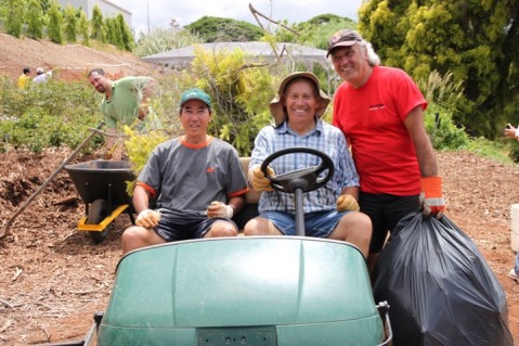 Rotarians pitch in at the Urban Garden Center's Peace Garden work day